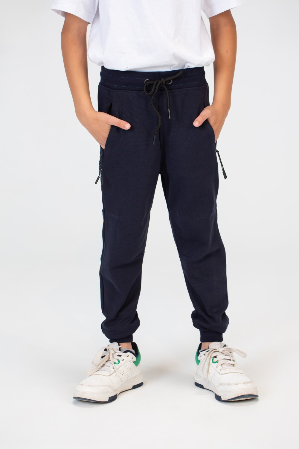 Boys Sweatpants With An Elasticated Waistband And Zippered Pockets On The Sides