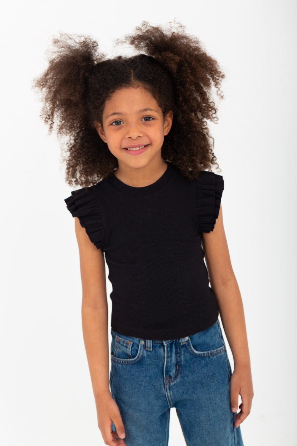 Girls' T-Shirt With Ruffles On The Shoulder And A Unique Material